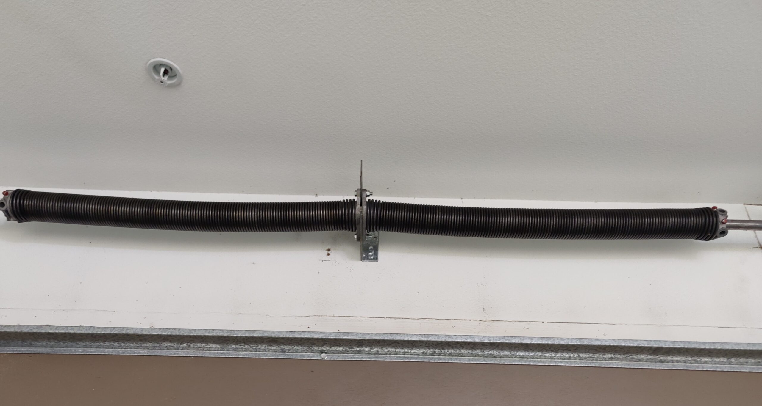 Same day garage door service torsion spring replacement in Santa Ana, CA on N Towner St